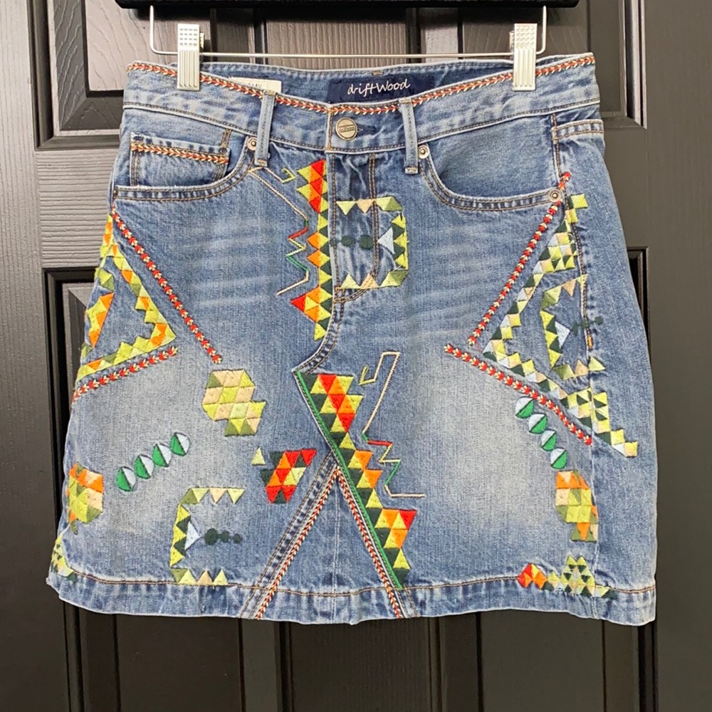 Denim skirt with colorful print.